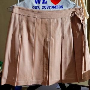 Pink pleated leather skirt